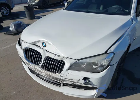 2015 BMW 740I из США, поврежденный, VIN WBAYA6C59FGK16663